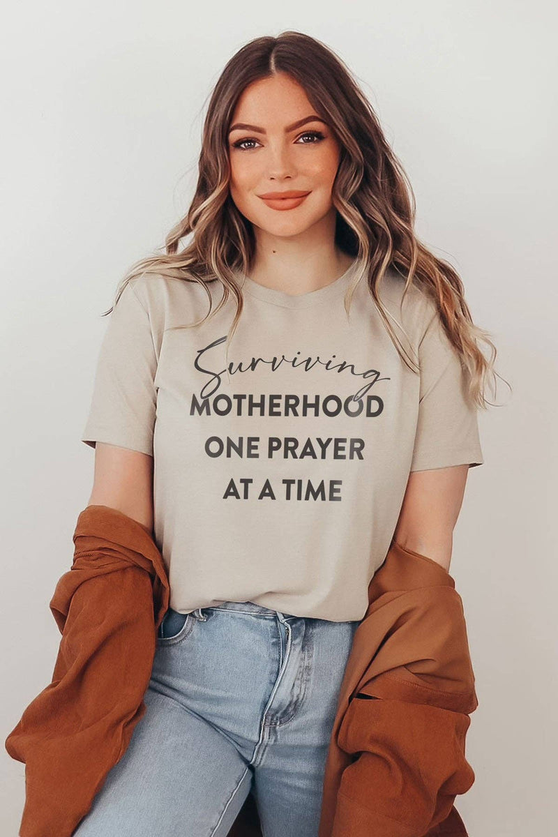 Surviving Motherhood Graphic Tee
